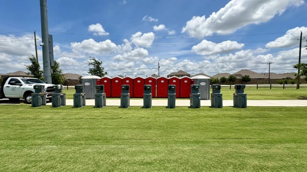 porta potty rentals and hand washing stations placed in an open area for event