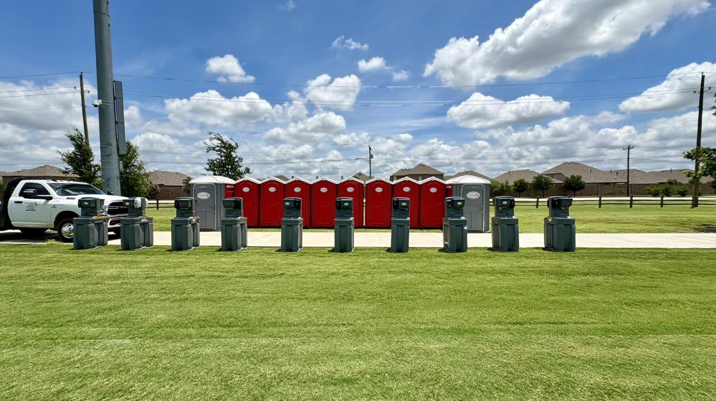 porta potty rentals and hand washing stations placed in an open area for event