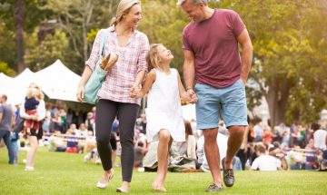 family attending a festival in Dallas, Texas