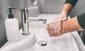 Man Washing Hands To Be Healthy