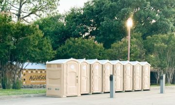 light brown porta potty rental and hand sanitizer (1)
