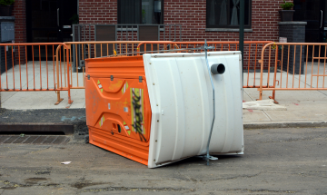 A flipped porta potty